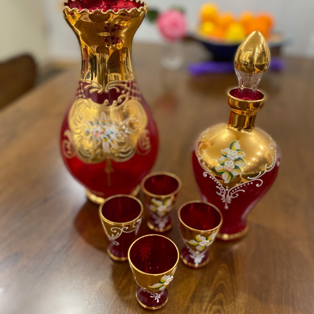 Decanter, vase and four shot glasses